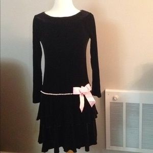 Black with pearls in a pink bow Beautiful dress